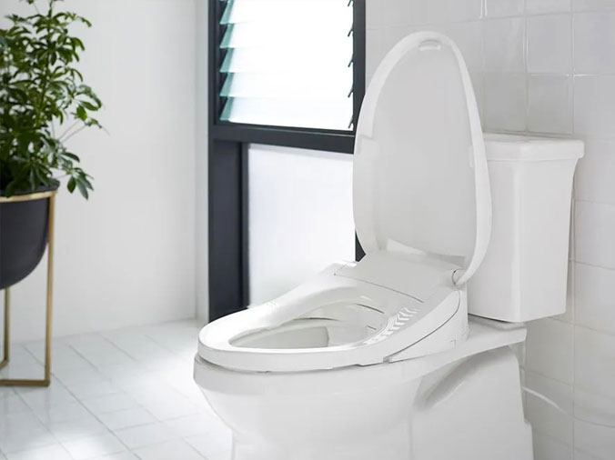 Bathroom toilet with open lid