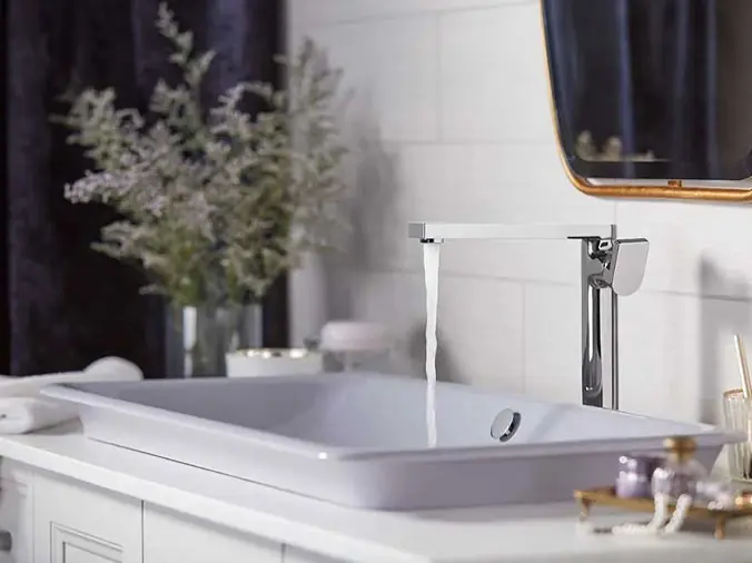 Bathroom sink with modern faucet