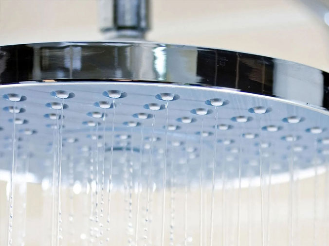 Closeup of drippinh shower head