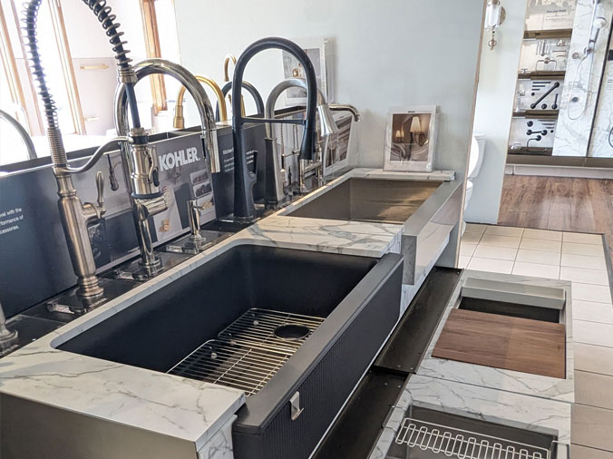 Kitchen sinks and faucets on display in the State Supply Kitchen & Bath Showroom in Ipswich MA
