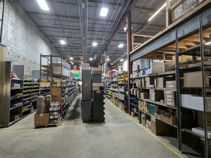 Shelves stocked with plumbing supplies at State Supply Ipswich
